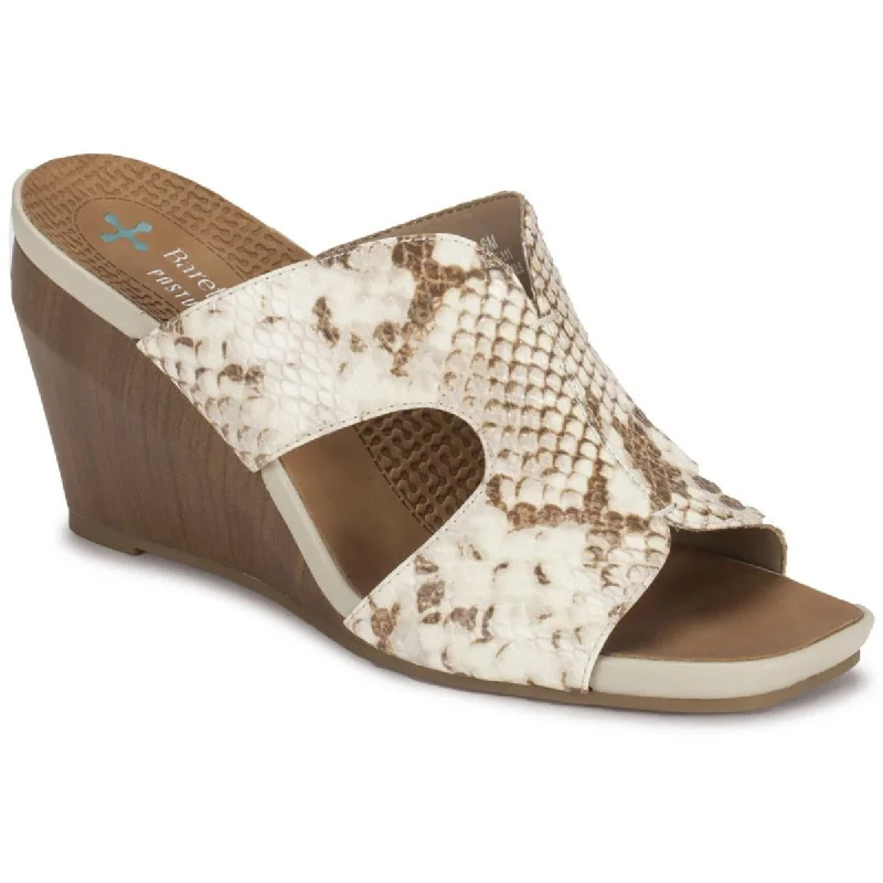 Women's Sandals with a Wedge Heel and a Tassel Detail in Orange for a Trendy LookBaretraps Womens Yinifer Faux Leather Animal Print Wedge Sandals Women's Sandals with a Wedge Heel and a Tassel Detail in Orange for a Trendy LookBaretraps Womens Yinifer Faux Leather Animal Print Wedge Sandals