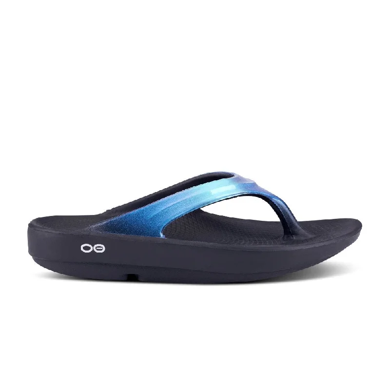 Women's Sandals with a Wedge Heel and a Tassel Detail in Orange for a Trendy LookOofos Women's OOlala Luxe Thong Atlantis Women's Sandals with a Wedge Heel and a Tassel Detail in Orange for a Trendy LookOofos Women's OOlala Luxe Thong Atlantis