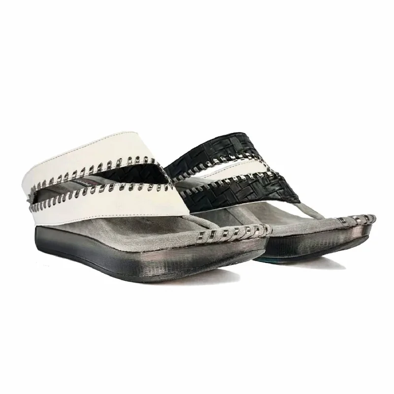 Women's Thong Sandals with a Beaded Design in Multicolor for a Beachy AestheticTita Reversible Sandal In White/black Women's Thong Sandals with a Beaded Design in Multicolor for a Beachy AestheticTita Reversible Sandal In White/black