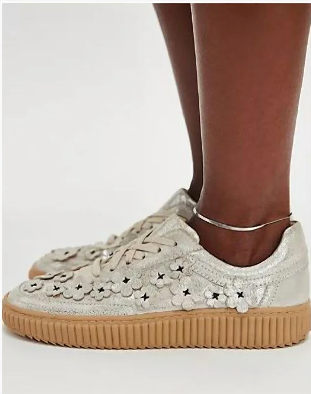 High - Top Women's Leather Sneakers in Black for a Stylish and Durable OptionWall Flower Sneakers In Champagne Metallic