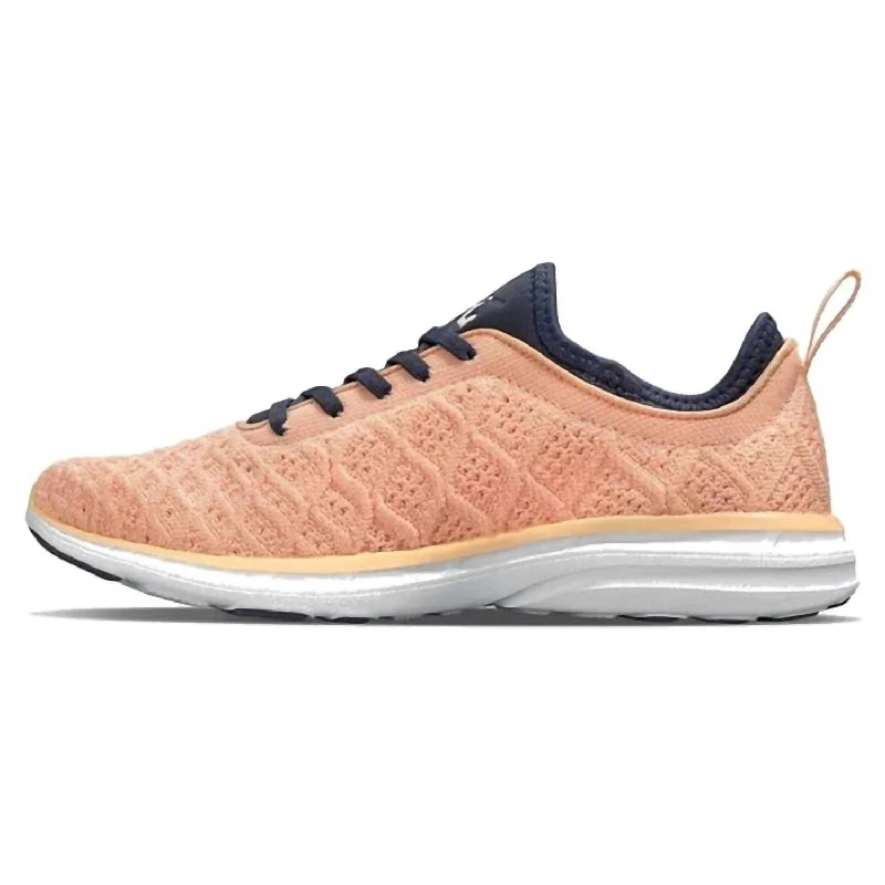Women's Sneakers with Removable Insoles for Easy Cleaning and CustomizationWomen's Techloom Phantom Sneaker In Peach/midnight/white